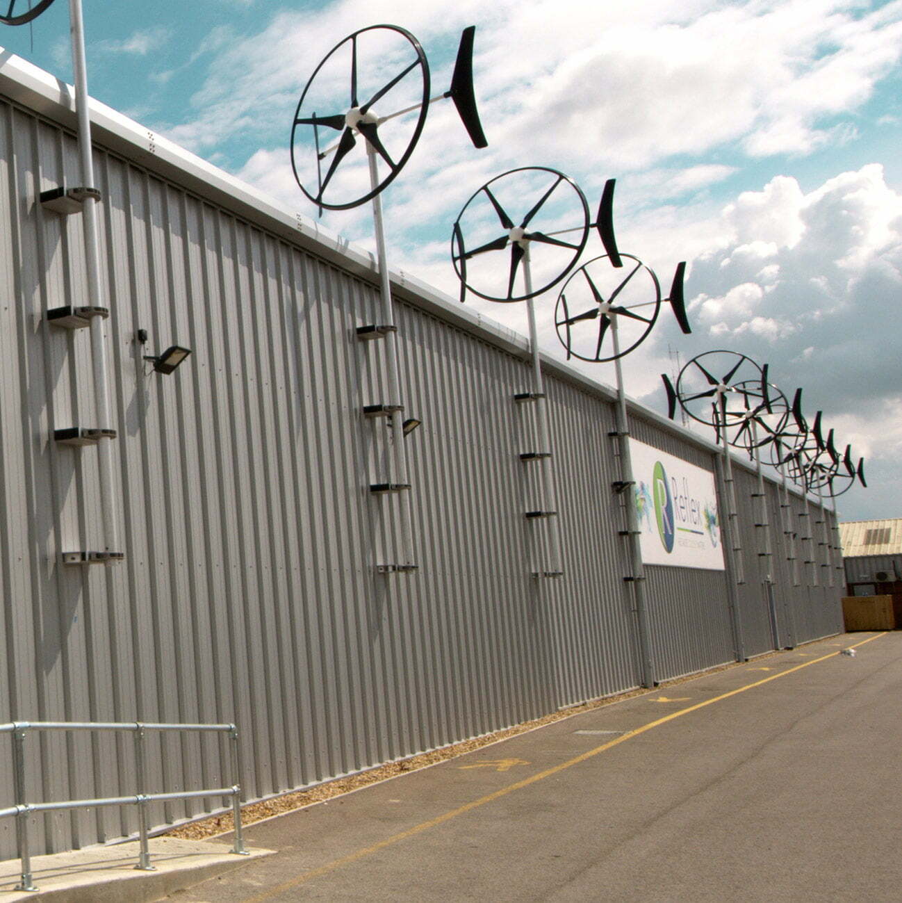 Reflex wall-mounted wind turbines